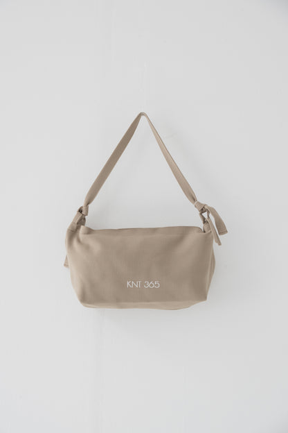 Slinggy 標誌米色